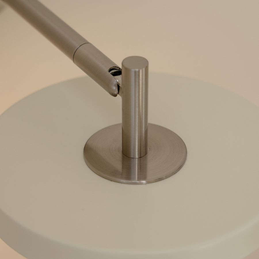 UMAGE_lifestyle_Asteria_wall lamp_short_hardwired_nuance mist_steel_(1).jpeg