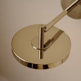 UMAGE_lifestyle_Asteria_wall lamp_short_polished brass_(3).jpeg