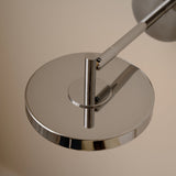 UMAGE_lifestyle_Asteria_wall lamp_short_polished steel_(3).jpeg